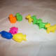 Fish, cat, and dog beads. Large holes will lace on pipe cleaners.