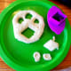 Use cookie cutters to make alien face.