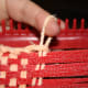 Pull that loop you pulled through so the one you started with is now wrapped around the lower part of the loop you are holding and repeat with the next loop all the way around.