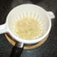 Cooked tagliatelle is drained