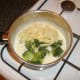 Tagliatelle and broccoli are added to Stilton cheese sauce
