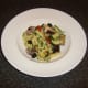 Fusilli cheese pasta with Mediterranean vegetables is served