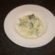 Broccoli and Stilton tagliatelle is plated and ready to be garnished