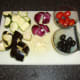 Vegetables are chopped and prepared for roasting