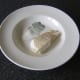 Skin is peeled from cooked and cooled cod before it is flaked