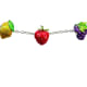 These lemon, strawberry and grapes charms get their lively color from glass paints.