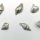 Sue shows you how to make a mold of a very small seashell and then reproduce it even smaller as a miniature silver shell charm.