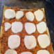 Slices of mozzarella. The slices do not need to touch.