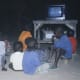 Children in Mali watch television. Image courtesy Olivier Keite and Wikipedia.