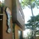 A shot of the shop's facade taken from the side.
