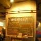 The real cafe menu and price list. Fancy coffee drinks and snack items are available.