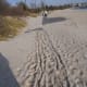 In November, 2011 there was a lot of sand over the boardwalk. Maybe due to Hurricane Irene or Winter Storm Alfred. Walking was difficult where there was sand. A woman with a stroller struggled to push beyond the sand.