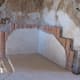 Bathhouse Pipes: Bathhouse reconstruction to demonstrate how room was heated.