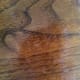 The second scratch is better--a second treatment and buffing may be needed yet to even out the look. I think this is because someone used wax furniture polish on the table at some point; it has an oil finish and wax should not have been used.