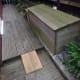 Recycle bin and lid decked out in decking off cuts.