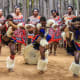 Zwazi men and women wearing traditional clothes