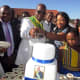 Vhavenda King, Toni Mphephu Ramabulana helped by the Queen Hulisani Ramabulana to cut the cake of his birthday, while Thovhele Kennedy Tshivhase (left) looked on and traditional leaders and community at large ululated.