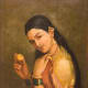 Woman Holding a Fruit