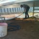 Sheets are wiped clean with shop towels prior to affixing sealing tape.