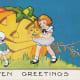 Free vintage Halloween card: children and large carved pumpkin