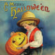 Vintage Halloween card: little boy with carved Jack-o-lantern