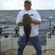 Gone Fishin Club Member Stacy with a small Flathead Catfish
