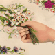 Vintage hand with forget-me-nots Valentine flowers