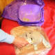 Tadpole models the mask with commercial papier mache mix, preparing a first layer as a base.