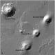 Shaded relief image derived from Mars Orbiter Laser Altimeter data, which flew onboard the Mars Global Surveyor-Image shows Olympus Mons and the three Tharsis Montes volcanoes . Photo credit NASA