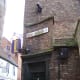 Go through the bar and into High Petergate