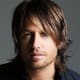 Keith Urban, 45, wearing layered long hair. To get the Keith Urban look shampoo hair and condition. Let dry naturally and with a small amount of gel, run your fingers through your hair. - 2013 Hairstyles for Men Short Medium Long Hair Styles Haircu