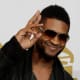 Usher, 34, at the Grammys. Usher is wearing a medium square hair style for black men. Usher's hair is cut short on both sides and long on top. Very trendy. - 2013 Hairstyles for Men Short Medium Long Hair Styles Haircuts, by Rosie2010