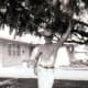 My brother Jim at our first home in McAllen, Texas