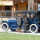 Three-month long centennial celebration included vintage cars and folks dressed in period costumes.