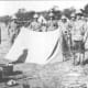 Men of the Durban Light Infantry stand guard over Bhambatha's body. (Photo: Transvaal Leader Weekly Edition, 30 June 1906).