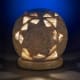 Flameless candles add a warming glow that can make an unfamiliar room seem more like home.