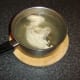 Chicken piece is boiled in water