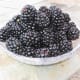 A bowl of scrumptious blackberries picked off the vine.