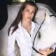 Princess Charlotte in Classic Horseback Riding Fashion with a white horse