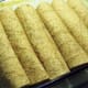 Spoon the veggie crumbles and beans onto tortillas and roll up in 9 x 12 pan.