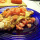 Serve with chopped tomato on top.