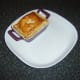 Oxtail and oyster pie is plated