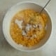 Adding wet ingredients to dry.