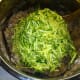 Add the grated zucchini and mix again.