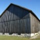 If the siding had been put on horizontally, rainwater would have collected on the edges of boards, causing them to rot.