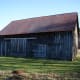 This barn does not have the raised stone foundation and ramp to a middle level, so it has two, rather than three stories.