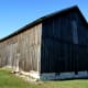 Many old barns were painted red or white. Others, such as this simple, yet beautiful, barn were left natural.