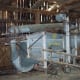 You can see the timber framing style in this old barn which has an antique grain thresher stored inside.