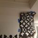Because I was unable to use the smaller stencil provided by the manufacturer, I had to tape the stencil up and onto the ceiling.