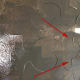 The arrows indicate where paint had seeped through.